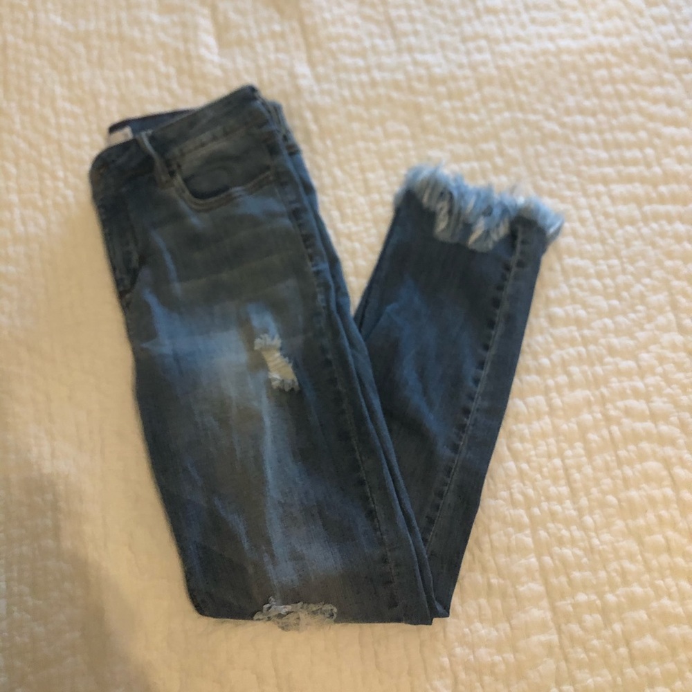 Light Washed Ripped Jeans